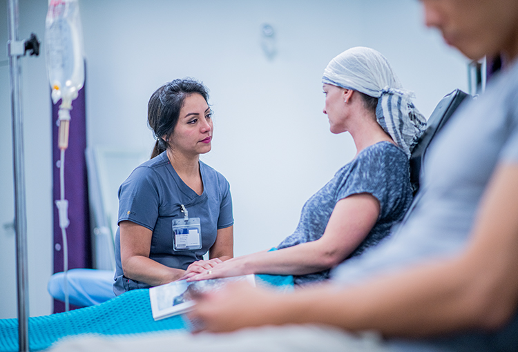 Nurse with cancer patient