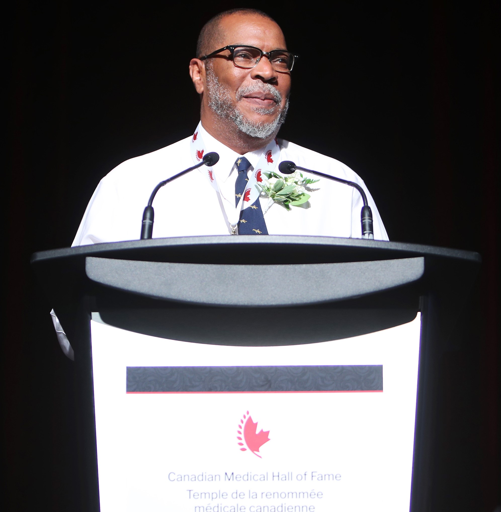 Carlos Blizzard receiving award in behalf of his dad